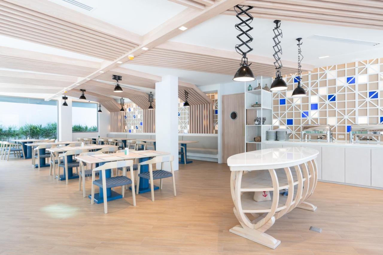 攀瓦布里海滨度假村【SHA Extra Plus】 攀瓦海滩 外观 照片 The interior of the restaurant